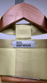 132 5. Issey Miyake Flat-Tuck Origami Suit