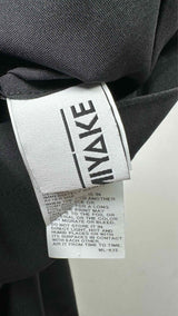 132 5. Issey Miyake Standard Dress