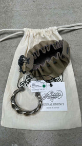 Natural Instinct Twist Angle Bangle