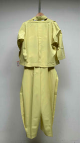 132 5. Issey Miyake Flat-Tuck Origami Suit