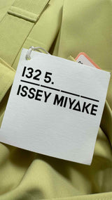 132 5. Issey Miyake Flat-Tuck Origami Suit