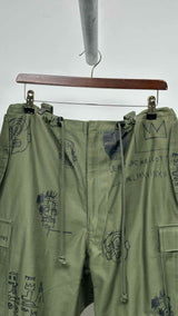 Junya Watanabe MAN X Jean Michel Basquiat Printed Cropped Suspender Pants